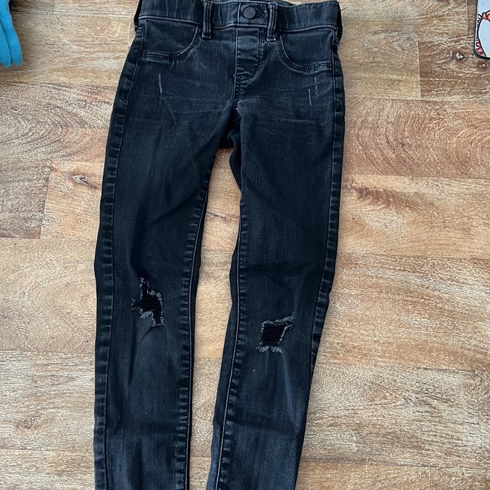 Girls distressed black skinny jeans